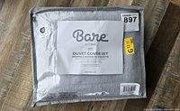 Sealed package showing Bare Home branding and dimensions