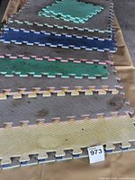Stacked foam mats showing quantity and edge profile