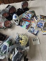 Overview of pucks, mini masks, trading cards