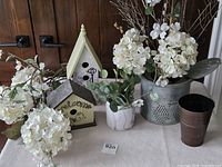 overall lot with minnow bucket, birdhouses, faux flowers, planters