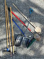 Group of all tools laid on gravel