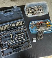 overall view of socket set, bin of sockets, tray of wrenches and drill bits