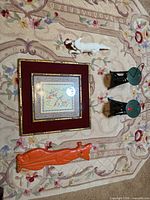 Group shot showing all five items laid out on rug