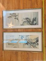 Both framed prints laid horizontally showing full images and frames