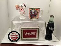 Group shot of all five Coca-Cola items