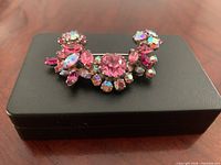 Front view showing pink and aurora borealis rhinestones