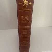 Spine showing gilt author name and title