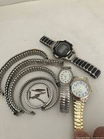 Group view of all watches, bands, pins