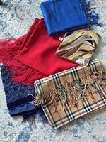 Overview of all five scarves layered together