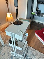 Full view of white 3-tier cart with item number tag attached