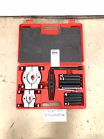Full kit in open red case showing all components