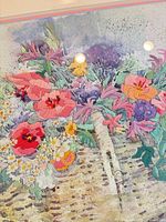 Close detail of floral basket embroidery stitches and colors