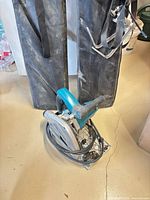 Makita plunge saw, cord, rail bags visible