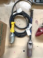 Torch and work light coiled together showing full lot