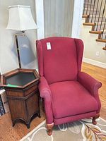 Wingback armchair beside hexagon side table