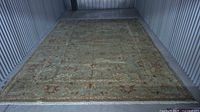 Full view of rug laid flat showing overall pattern and color