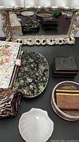 Mirror with surrounding accessories displayed