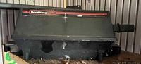 Front view of Broil King tabletop grill showing lid and brand badge