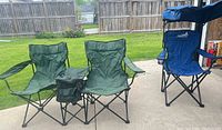 Overview showing green loveseat, blue canopy chair, steel frames