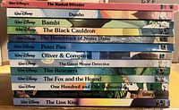 Spine view showing all 13 Walt Disney Classic Series titles
