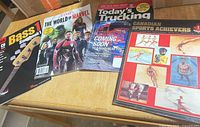 Group shot of all four publications