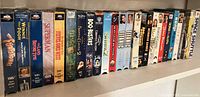 Shelf view showing full row of VHS spine titles