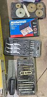 All tool sets laid out: tap & die box, puller kits, bearing driver plates and handle
