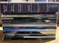 Stack showing Select Editions hardcover and ten magazine spines