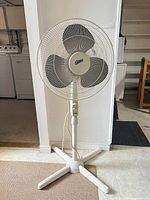 Full view of Super pedestal fan showing overall structure and base