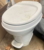 Side view of Thetford cassette toilet with closed lid