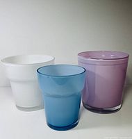 Group shot of three glass planters