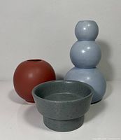 Front view of all three ceramic pieces