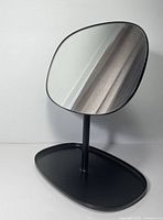Front angled view showing mirror and tray base