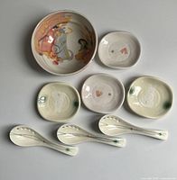 Group overview of studio bowl, 4 dipping bowls and 4 spoons