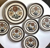 All seven plates displayed to show pattern and sizes