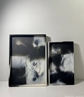 Front view of both trays standing upright