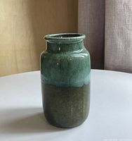 Full view of ceramic vase showing shape and two-tone glaze