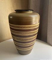 Full view of vase front, showing shape and glaze