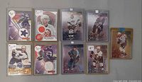 All nine cards laid out showing autographs and jersey swatches