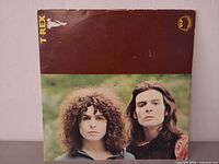 Front gatefold cover with band members
