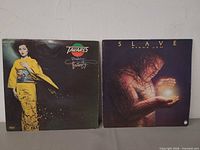 Front covers of both LPs