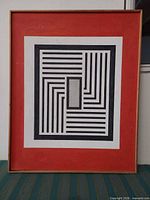 Frontal view of framed geometric painting