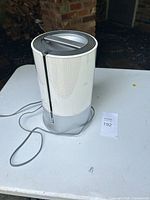 Side view of Honeywell humidifier with power cord
