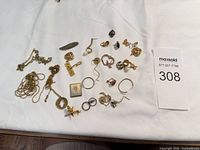 Entire lot laid out on white cloth showing all pieces