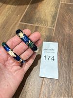 Both enamel turtle bangles front view