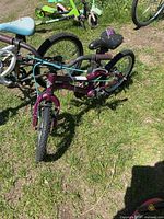 Full view of purple CCM kids bike