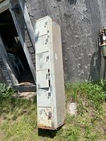 Full view of metal locker standing outdoors