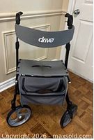 Front view of Drive Nitro rollator showing seat, backrest, storage pouch and wheels