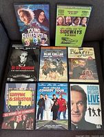 All eight DVD cases front covers visible