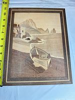 Full view of marquetry panel with measuring tape showing height